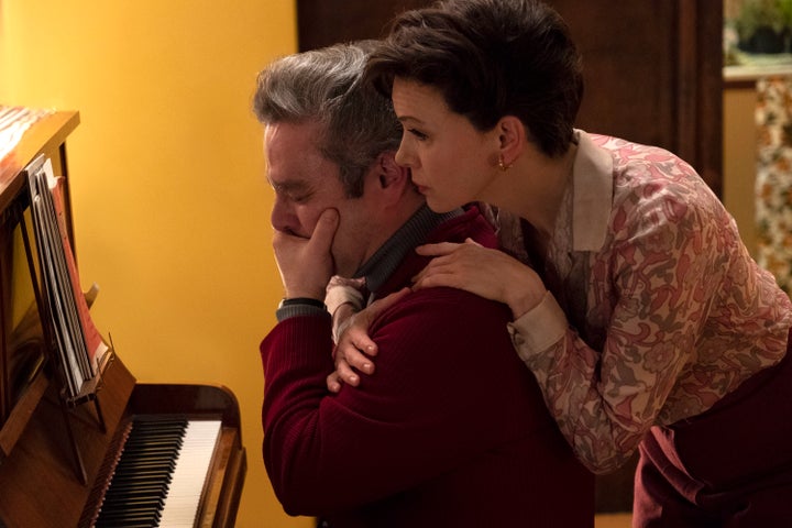 In "Judy," Judy Garland (Renée Zellweger) is shown comforting a gay devotee, Dan (Andy Nyman).