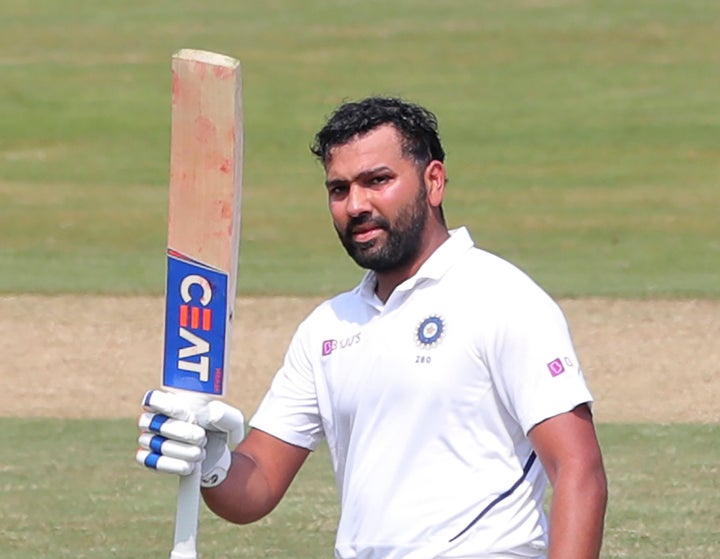 Rohit Sharma after scoring hundred runs during the first day of the first cricket test match against South Africa.