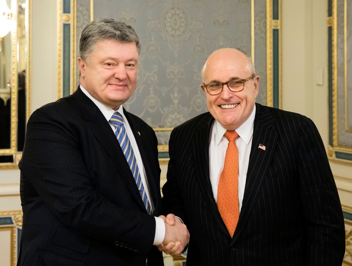 Ukraine's then-President Petro Poroshenko, left, poses with Rudy Giuliani during their meeting in Kiev, Ukraine, Wednesday, Nov. 22, 2017.