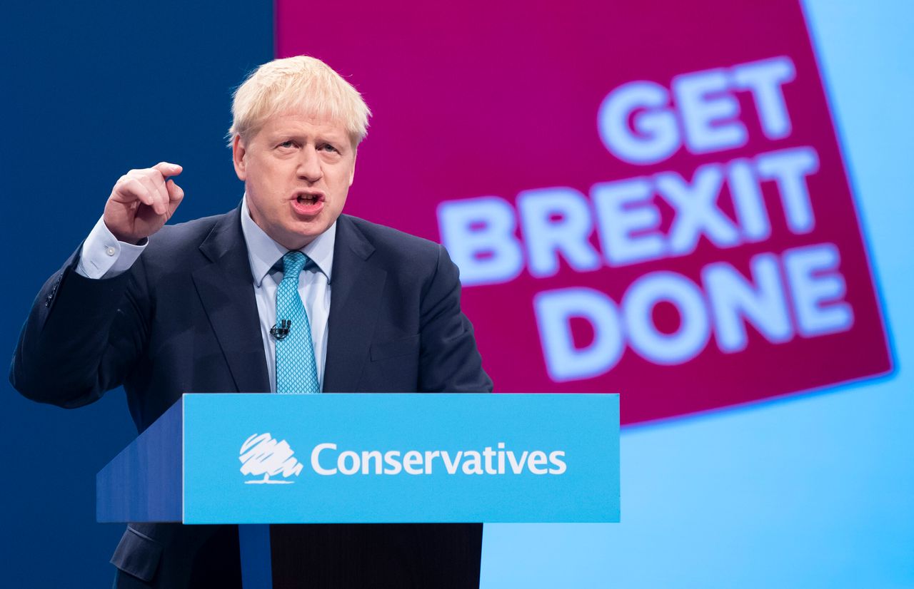 Boris Johnson on stage giving his speech at the Conservative Party Conference