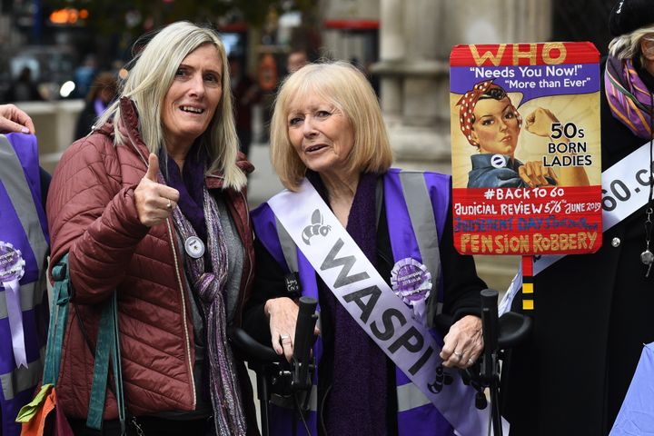 Campaigners outside the Royal Courts of Justice in London,