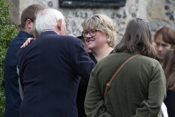 Libby Squire's mother, Lisa (centre) at St Lawrence's Church in West Wycombe, Buckinghamshire, after the service