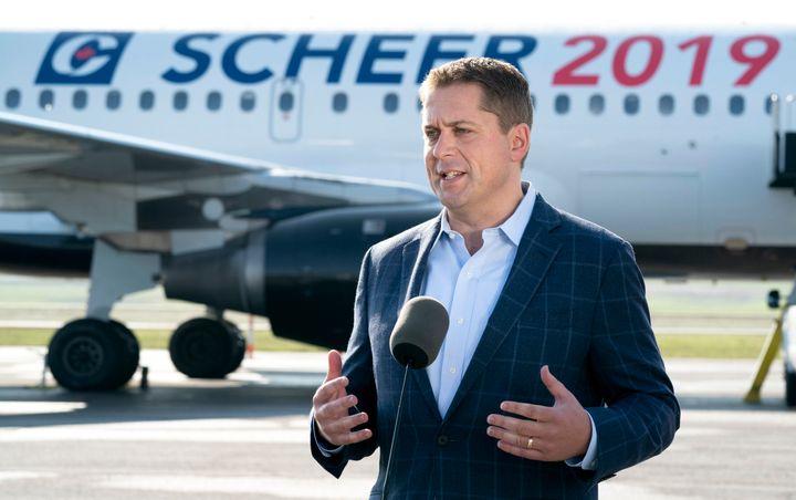 Conservative Leader Andrew Scheer responds to questions prior to boarding his campaign plane in Ottawa on Sept. 11, 2019. 