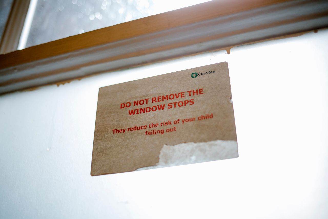 A safety notice in the homeless hostel where Mohammad and his family live