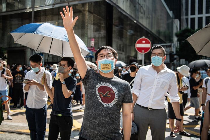 People protest a government ban on face masks in Central on October 4, 2019 in Hong Kong. (Photo by Laurel Chor/Getty Images)