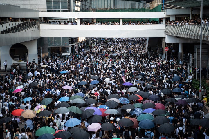 People protest a government ban on face masks in Central on October 4, 2019 in Hong Kong. (Photo by Laurel Chor/Getty Images)