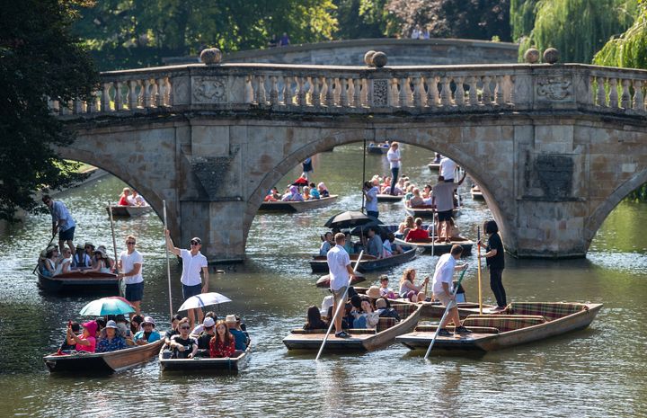 People punt along the River Cam in Cambridge during the late August bank holiday, close to where the UK's highest ever temperature was recorded a month before. 