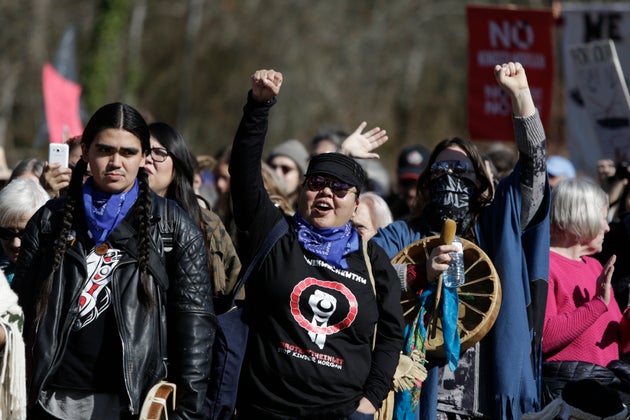 Indigenous groups and others demonstrate against the expansion of the Trans Mountain pipeline project...