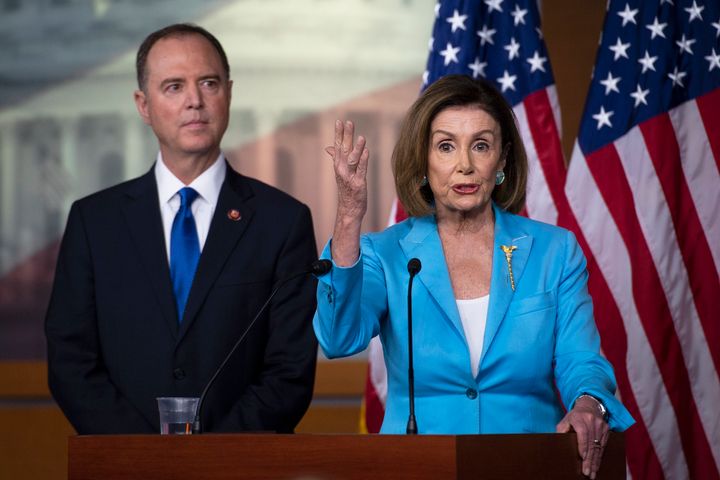Speaker Pelosi, right, addressed reporters alongside Intelligence Committee Chairman Adam Schiff (D-Calif.). Her support for an impeachment inquiry has largely quieted critics.
