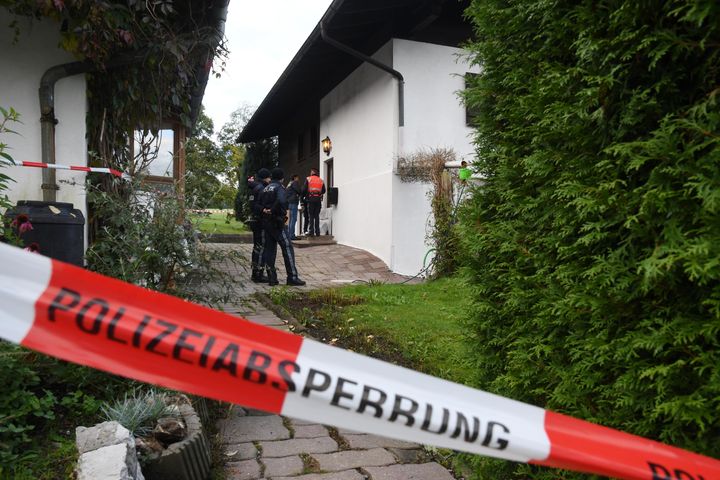 Policemen secure the crime scene around a house in Kitzbuehel, Austria, where five people were killed on October 6, 2019.