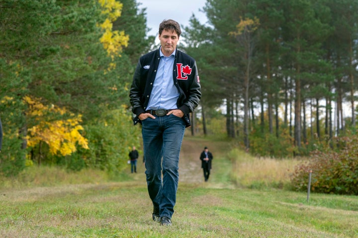 Prime Minister Justin Trudeau arrives to meet the press while campaigning in Mont Joli, Que., on Oct. 4, 2019.