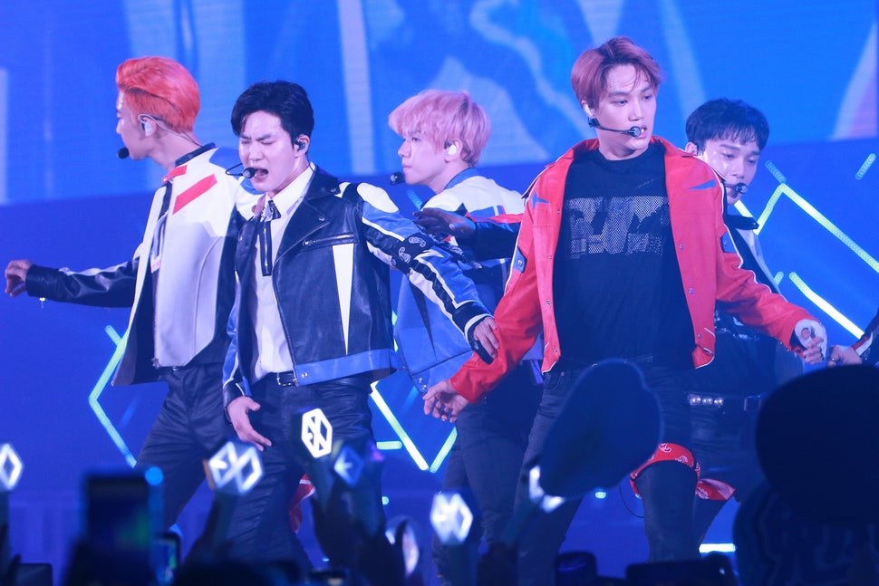 Members of South Korean boy band EXO perform on the stage in concert at AsiaWorld-Expo on August 10, 2019 in Hong Kong. 