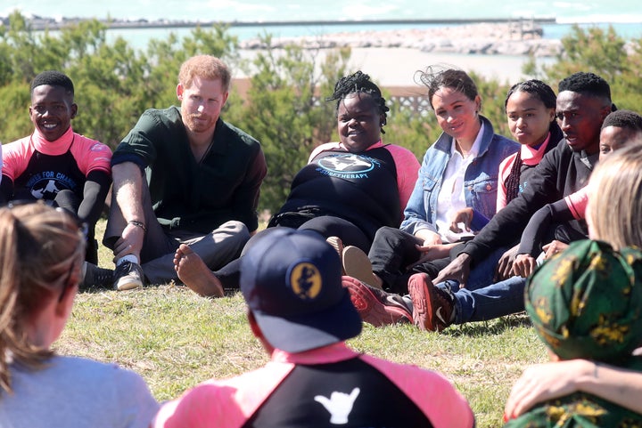 The Duke and Duchess of Sussex participated in a group activity alongside Waves for Change to promote positive thinking on Sept. 24, in Cape Town, South Africa. 