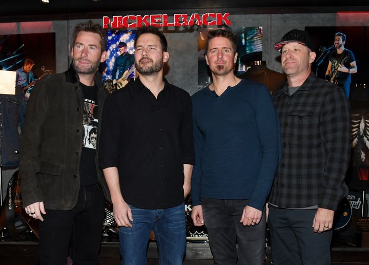 LAS VEGAS, NV - FEBRUARY 22: (L-R) Frontman Chad Kroeger, guitarist Ryan Peake, drummer Daniel Adair and bassist Mike Kroeger of Nickelback attend a memorabilia case dedication ahead of the band's five-night "Feed the Machine" residency at The Joint inside the Hard Rock Hotel & Casino on February 22, 2018 in Las Vegas, Nevada. (Photo by Ethan Miller/Getty Images)