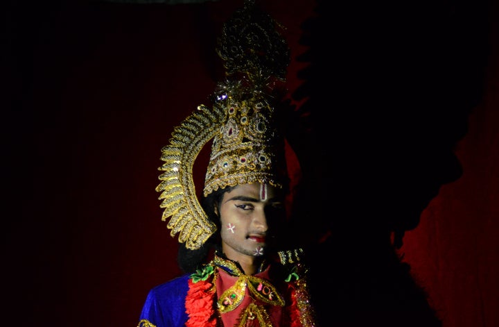 An artist dressed as Ram, performs during the play of Ramleela, in Allahabad on October 11, 2018.