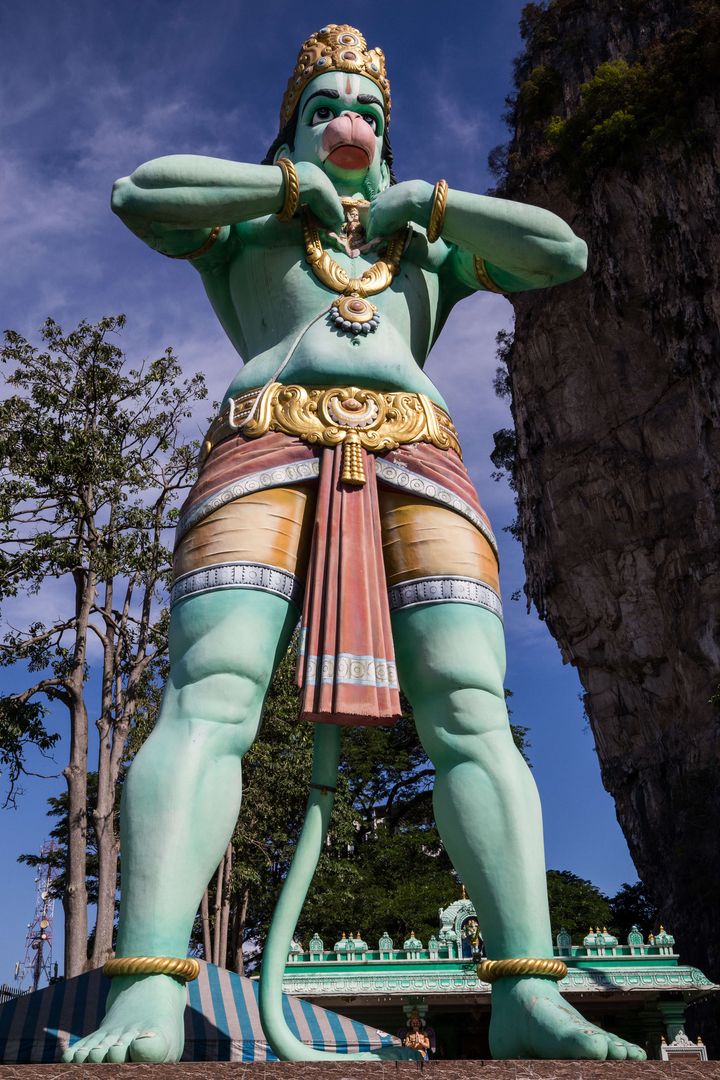 KUALA LUMPUR, MALAYSIA — Hanuman at Batu Caves Temple - dedicated to Lord Muruga with ornate shrines. 