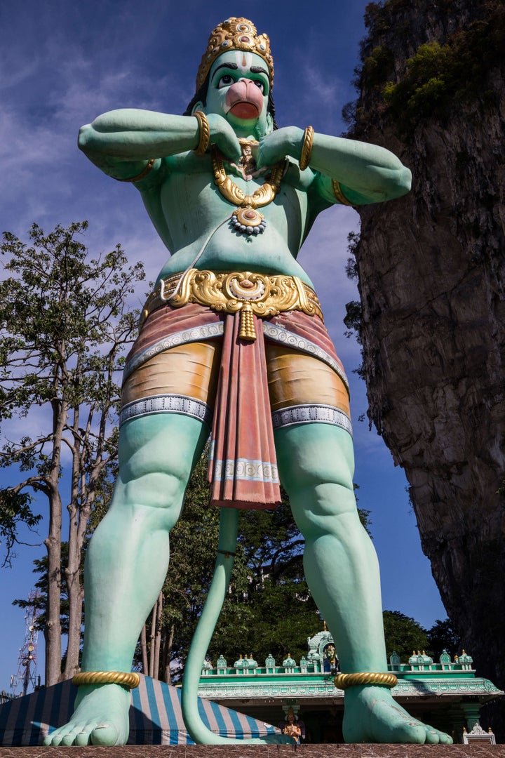 KUALA LUMPUR, MALAYSIA — Hanuman at Batu Caves Temple - dedicated to Lord Muruga with ornate shrines. 