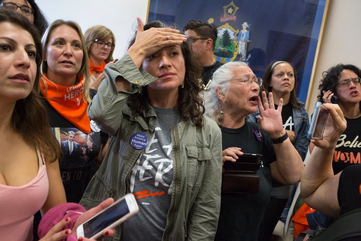 Women's rights activists opposed to Brett Kavanaugh's nomination to the Supreme Court occupy Senator Susan Collins of Maine's office and listen to her speech on the Senate floor explaining why she is supporting the nomination on October 5, 2018, in Washington, D.C.
