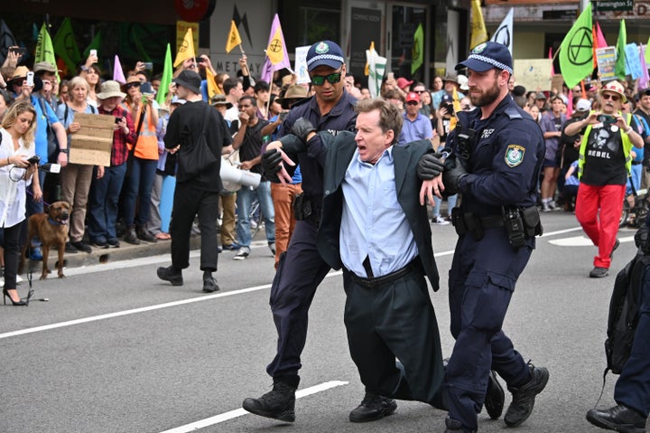 Arrests take place at Monday's Sydney protests. 