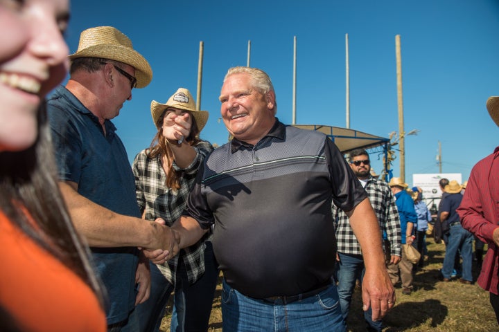 Ontario Premier Doug Ford welcomes visitors to the International Plowing Match in Verner, Ont. on Sept. 17, 2019.