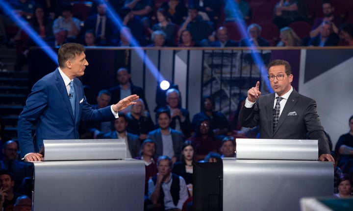 People's Party of Canada leader Maxime Bernier and Bloc Quebecois leader Yves-Francois Blanchet speak during the leaders' debate in Gatineau, Que. on Oct. 7, 2019.