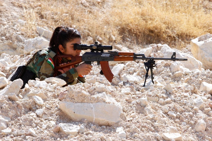 An Iranian Kurdish woman, who has joined Kurdish peshmerga fighters, takes part in a training session in a military camp in Erbil, Iraq July 9, 2019.