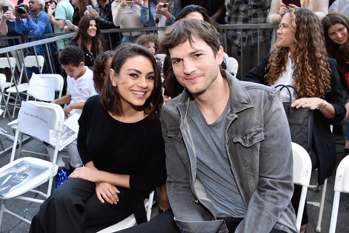 Mila Kunis and Ashton Kutcher attend Zoe Saldana's Walk of Fame star ceremony in May 2018.