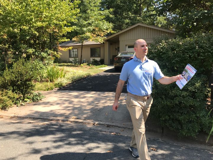 Steve Descano, the Democratic candidate for Fairfax County prosecutor, knocks on doors last month.