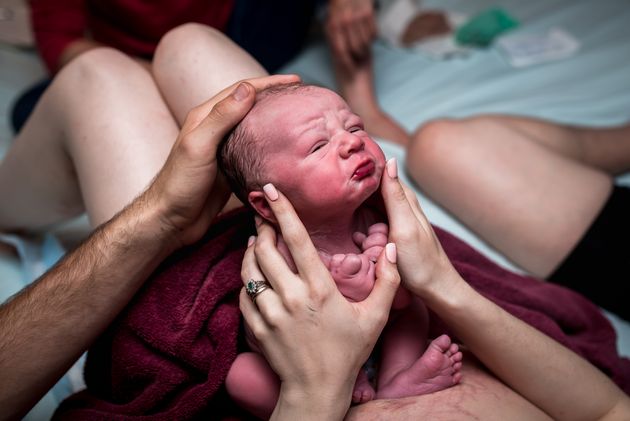 The Sweet Birth Story Behind This Newborns Pout Face