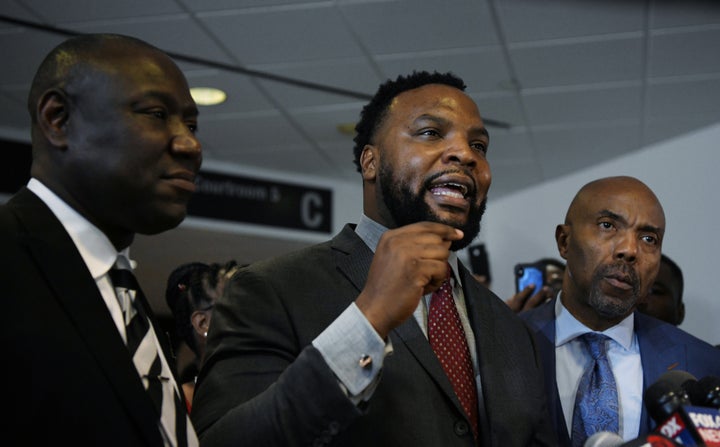 Botham Jean's family attorneys, Benjamin Crump, Lee Merrit and Daryl Washington, address the press after the conviction