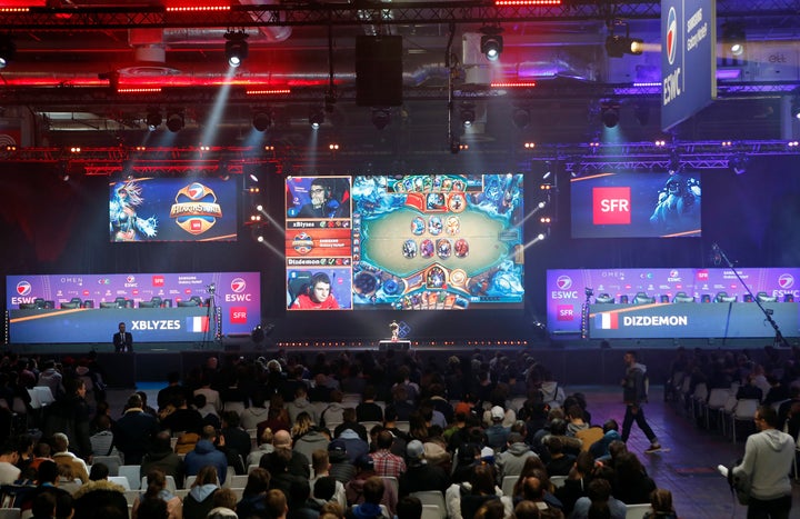 Fans watch a Hearthstone video game tournament during Paris Games Week last October in France.