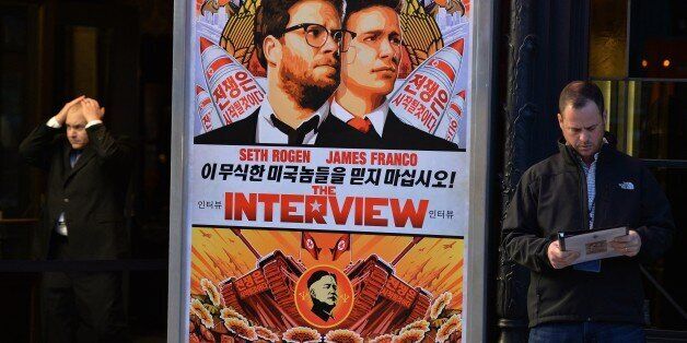 Security is seen outside The Theatre at Ace Hotel before the premiere of the film 'The Interview' in Los Angeles, California on December 11, 2014. The film, starring US actors Seth Rogen and James Franco, is a comedy about a CIA plot to assassinate its leader Kim Jong-Un, played by Randall Park. North Korea has vowed 'merciless retaliation' against what it calls a 'wanton act of terror' -- although it has denied involvement in a massive cyber attack on Sony Pictures, the studio behind the fi