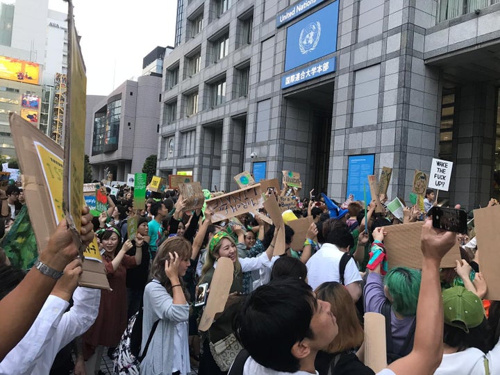 Activists protesting outside of the United Nations University in Tokyo on Sept. 20.