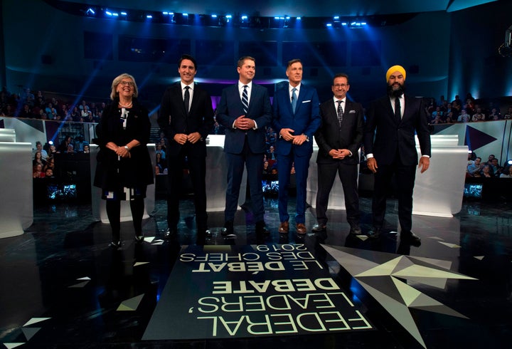 From left, Green Party of Canada Leader Elizabeth May, Liberal Leader Justin Trudeau, Conservative Leader Andrew Scheer, People's Party of Canada Leader Maxime Bernier, Bloc Quebecois Leader Yves-Francois Blanchet and NDP Leader Jagmeet Singh pose for a photograph before the Federal Leaders Debate in Gatineau, Que., on Oct. 7, 2019.