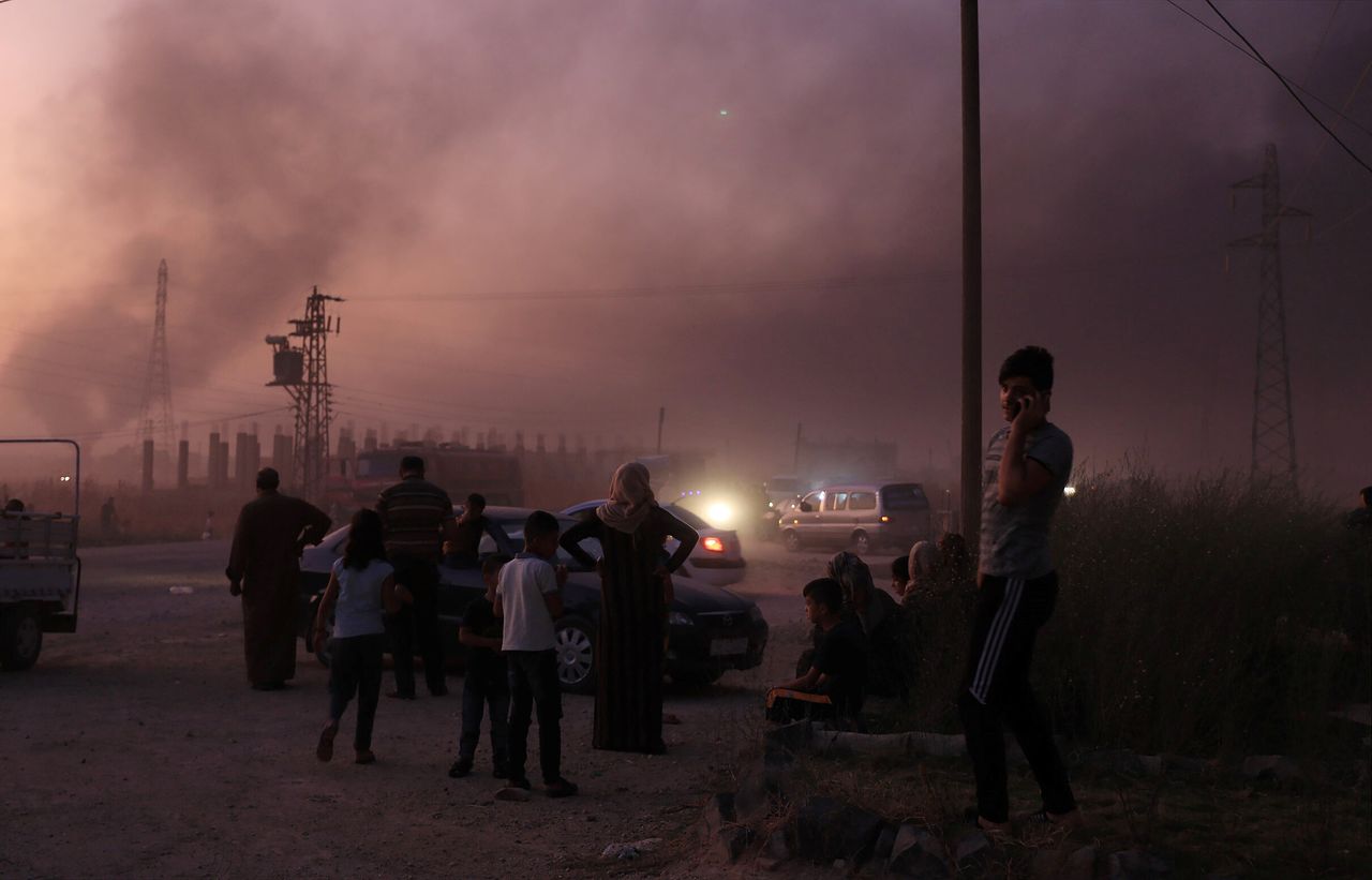 Κάτοικοι στο Ρας αλ Αϊν ετοιμάζονται να εγκαταλείψουν την πόλη ενώ είναι σε εξέλιξη οι τουρκικοί βομβαρδισμοί. 