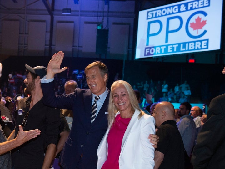 Maxime Bernier and his wife Catherine Letarte leave the room at the launch of his campaign on Aug. 25, 2019 in Sainte-Marie Que.