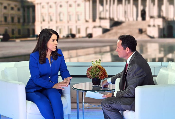Democratic Presidential Candidate Tulsi Gabbard talks to host Brian Kilmeade at "FOX & Friends" at Fox News Channel Studios on Sept. 24, 2019 in New York City.