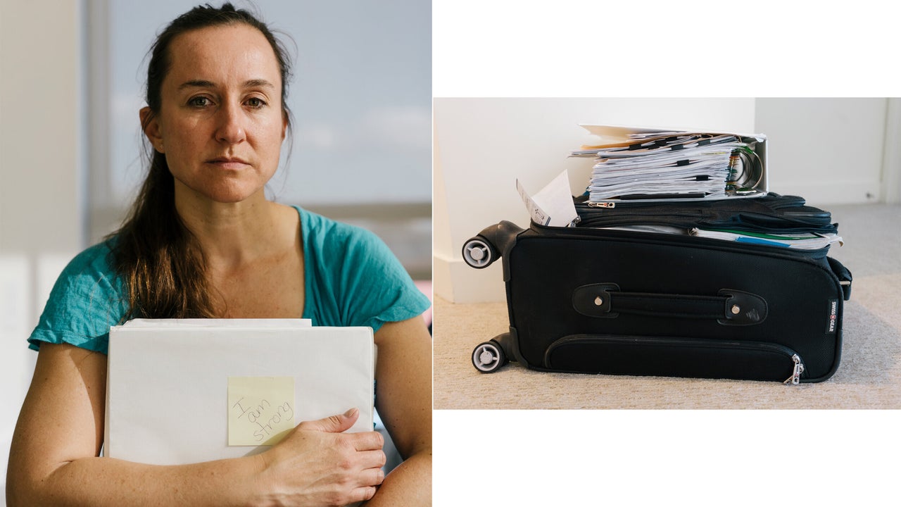 Leah Olszewski holds a binder of documents stemming from her allegations against Cardin. More are stored in this suitcase. 