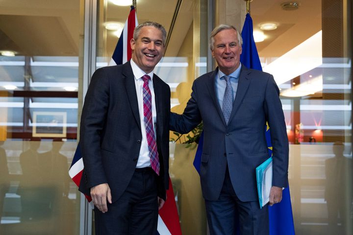 Britain's Brexit Secretary Stephen Barclay poses with European Union's chief Brexit negotiator Michel Barnier ahead of a meeting at the EU Commission headquarters in Brussels