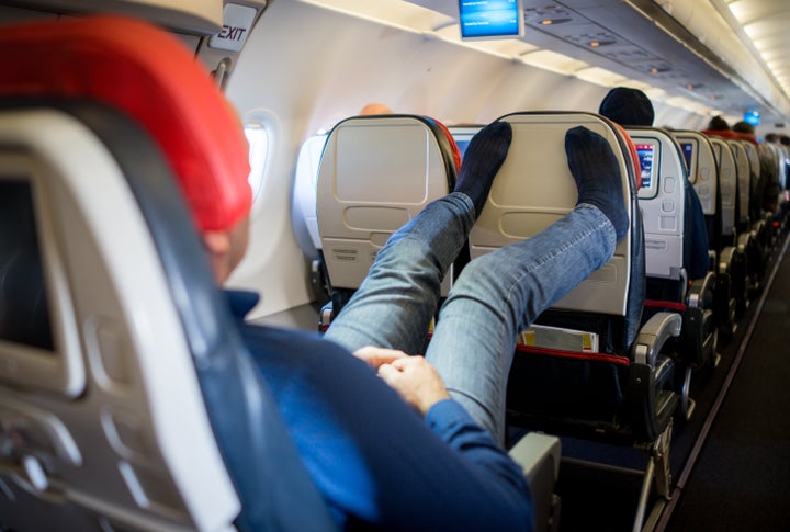 Etiquette experts caution against taking your shoes off during a flight.