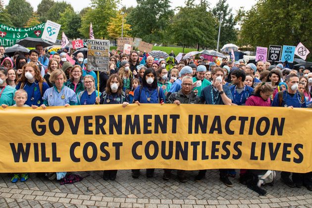 Doctors gather to protest in support of Extinction Rebellion (XR) at Jubilee Gardens, London, to highlight deaths caused by air pollution.