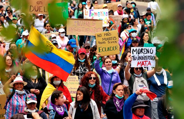 Women march during the 10th day of a protest over a fuel price hike ordered by the government to secure an IMF loan, in the surroundings of the National Assembly in Quito on October 12, 2019. - The indigenous umbrella group CONAIE rejected an offer of direct talks from President Lenin Moreno to end the protests on the grounds that 