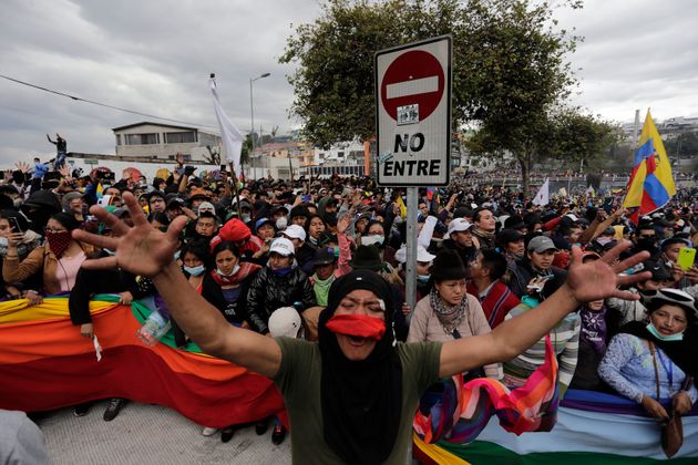 Indigenous people protest outside the National Assembly during they protest against the economic measures imposed by the president of Ecuador, Lenin Moreno.