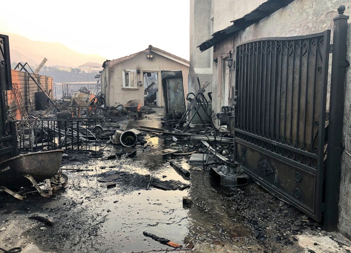 Santa Ana wind driven flames destroyed this home on Beaufait Ave. in Porter Ranch, Calif,. on Friday, Oct. 11, 2019. 