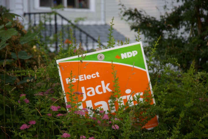 An old Jack Harris campaign sign is pictured in a flower bed outside a house in St. John's.