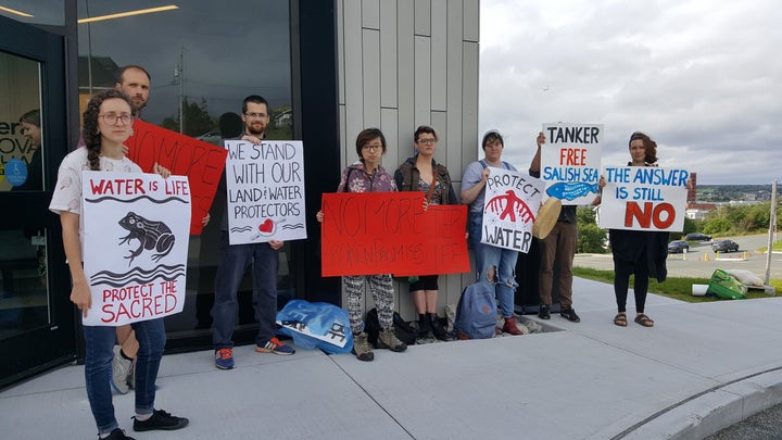 Protesters gather outside a Liberal fundraiser at Memorial University's Signal Hill campus in St. John's on Aug. 6, 2019.