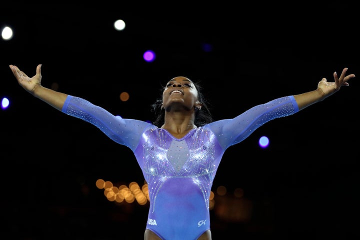 Gold medalist Simone Biles of the United States performs on the floor in the women's apparatus finals at the Gymnastics World Championships in Stuttgart, Germany, Sunday, Oct. 13, 2019.