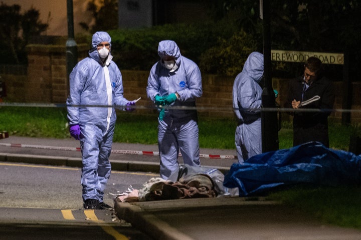 Police forensics officers at the scene of a fatal stabbing on Barnehurst Avenue, in Bexley, south east London.