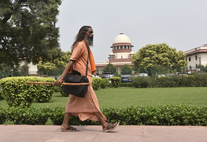A sadhu arrives for the Ayodhya land dispute case hearing, at Supreme Court on September 16, 2019 in New Delhi.