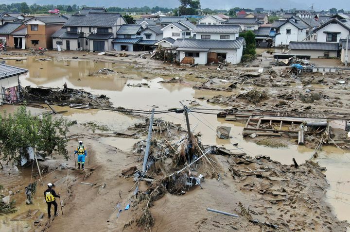 Typhoon Hagibis dropped record amounts of rain for a period in some spots, according to meteorological officials, causing more than 20 rivers to overflow. 